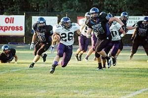 Junior running back Jordan Harris (26) ran 13 times for 101 yards and three touchdowns in Glen Este’s season-opening win over West Clermont rival Amelia.