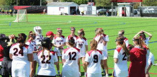 
			
				                                Milford Head Coach Becca McClouth addressing her team during an April 13, 2024, matchup against Walnut Hills.
 
			
		